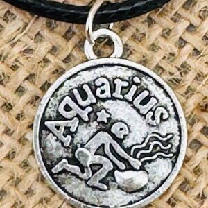 Aquarius Zodiac Necklace – Silvertone Astrology Pendant on Black Leather Cord
